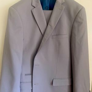 Beautiful suit like new, worn 3 times. Purchased before Covid. Double vented